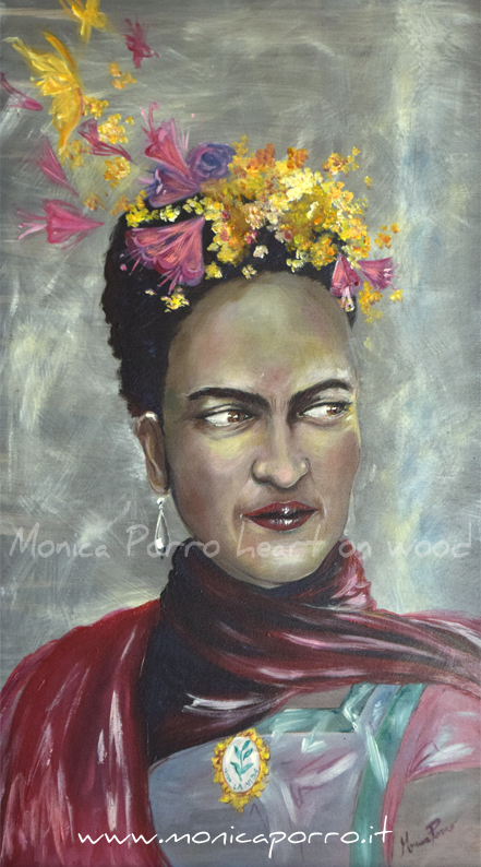 "Freedom" un dipinto ad acrilico su legno dedicato alla pittrice Frida Kahlo, che è ritratta su uno sfondo grigio, con lo sguardo rivolto a destra e una sciarpa rosso scuro al collo. In testa porta dei fiori gialli e rosa che sembrano prendere vita.